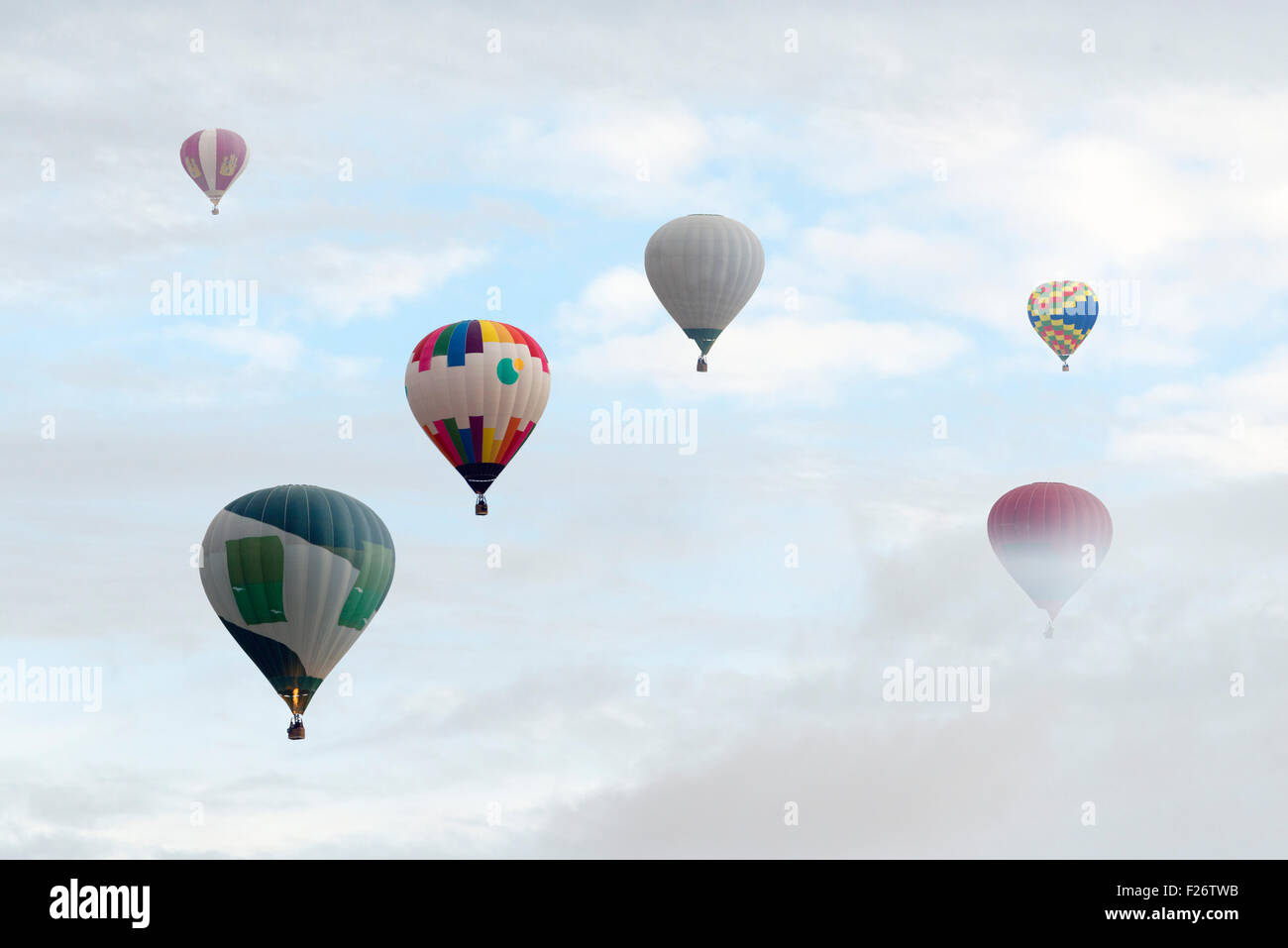 colorful hot air balloons against blue sky Stock Photo