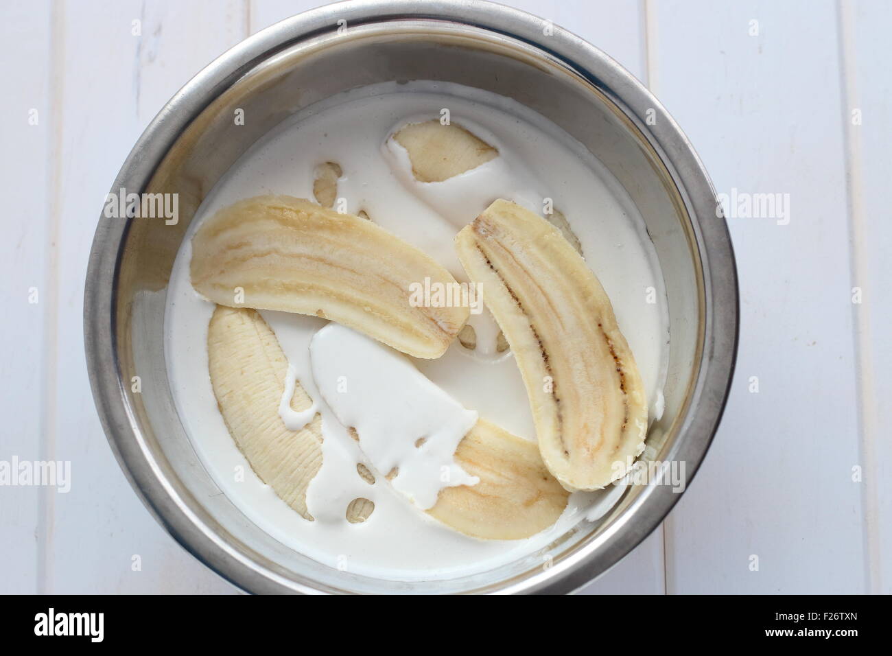 Sliced Bananas in rice flour batter before deep frying Stock Photo Alamy