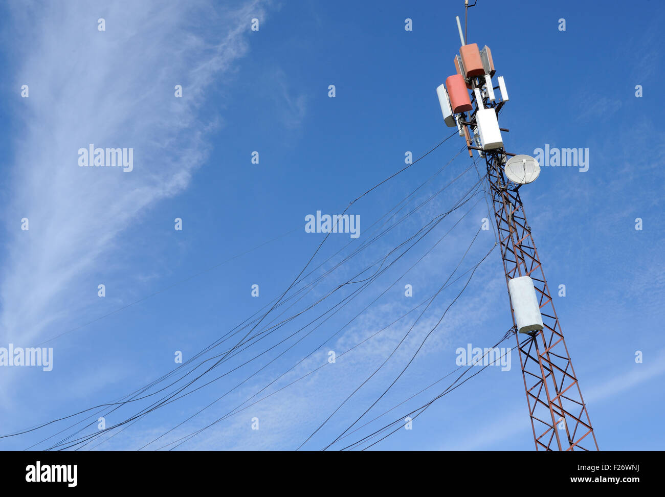 A telecommunications tower with trailing cables in the thirteenth century Berat Castle, Kalaja e Beratit. Stock Photo