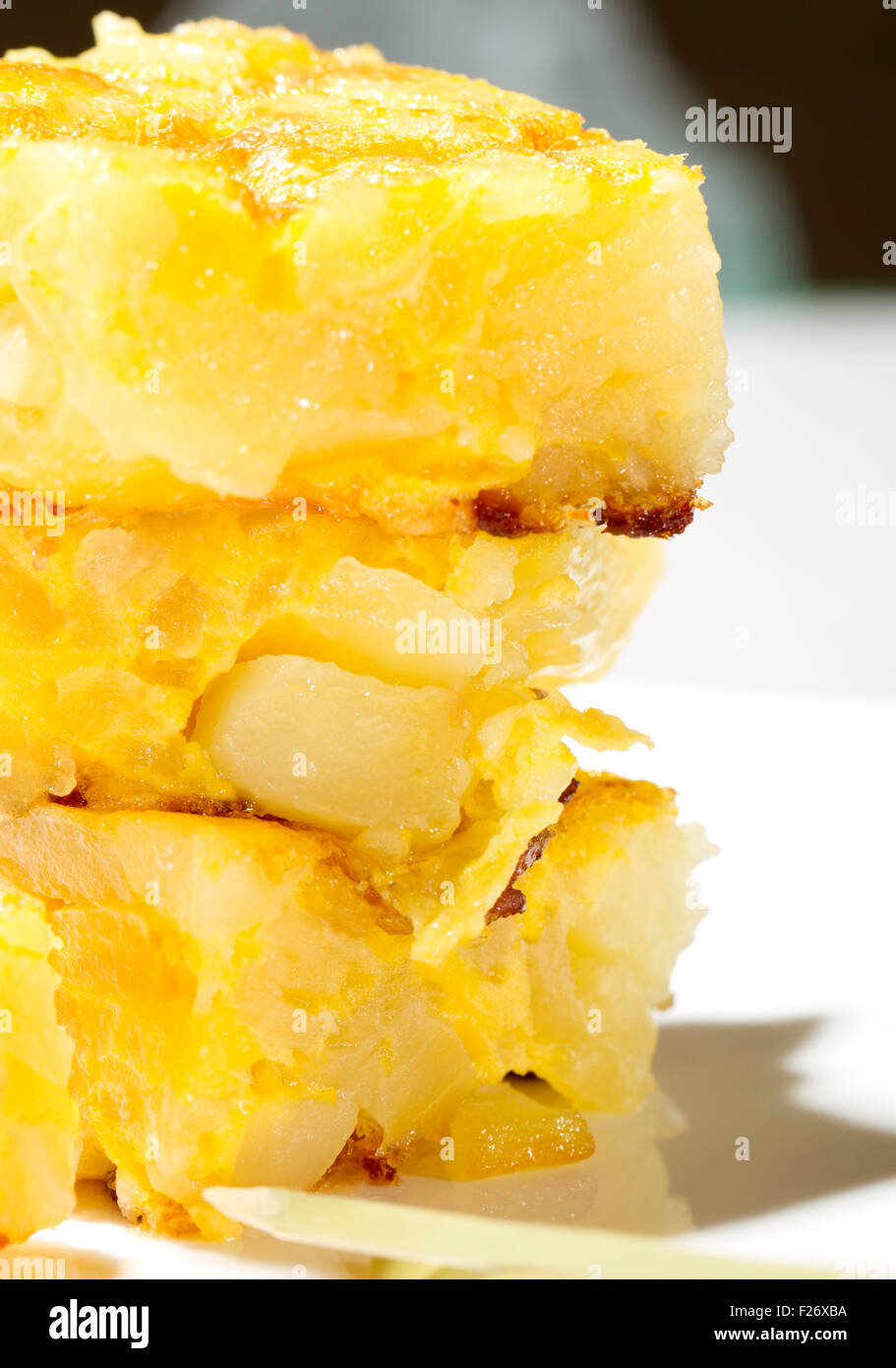 spanish omelette, with potatoes, eggs, garlic, olive oil and salt Stock Photo