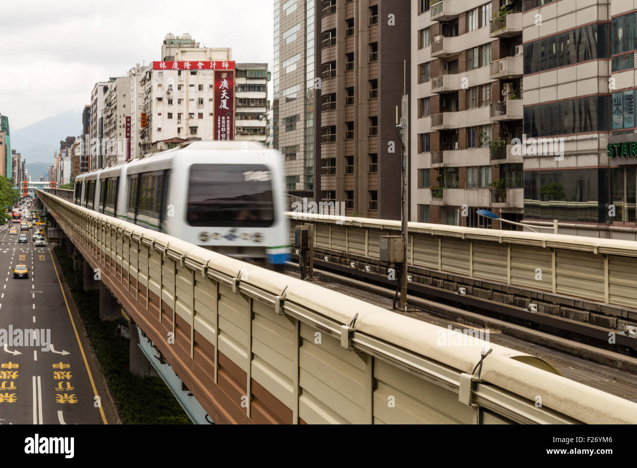 TAIPEI, TAIWAN AUGUST 29, 2015 Street view of Taipei with MRT carriages on the rail. The