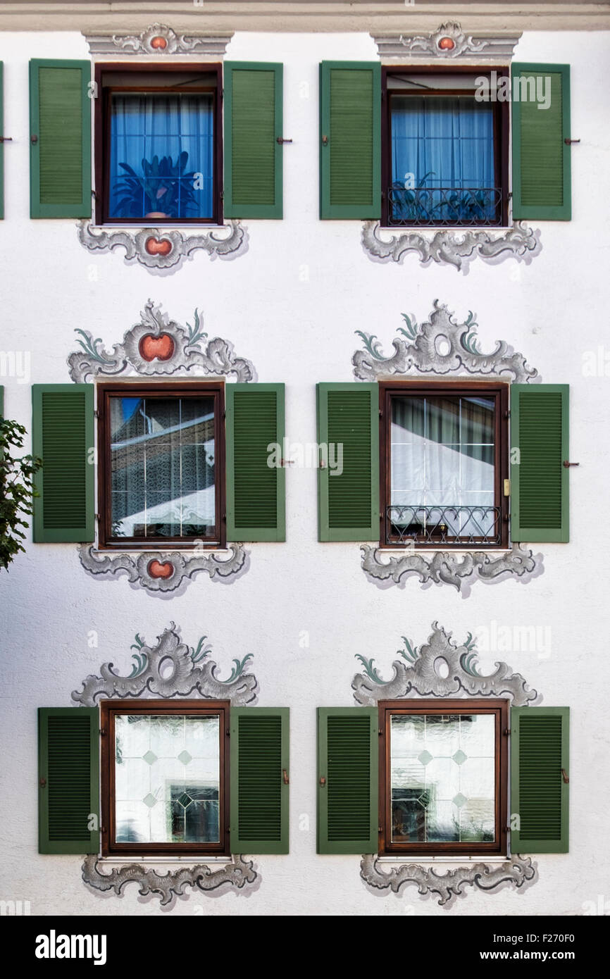 Bavarian building detail,  Shuttered windows and decorative paintwork. Füssen Town, Ostallgaü, Bavaria, Germany Stock Photo
