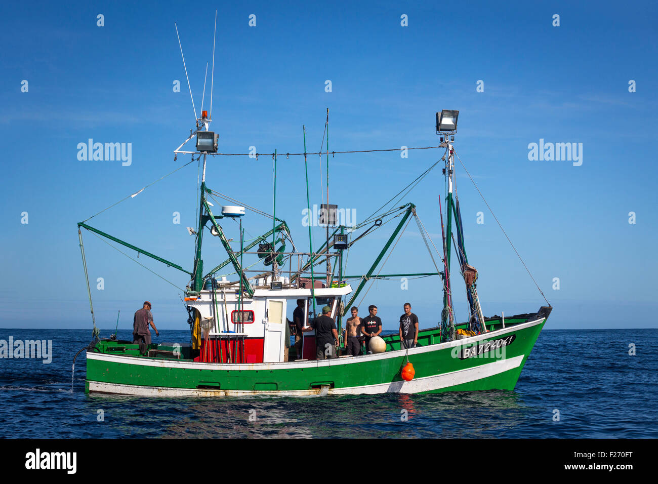 The Basque sunflower oil powered 'Lapurdi' sardine boat, with her crew (France). Biofuel powered ship. Fishermen. Stock Photo