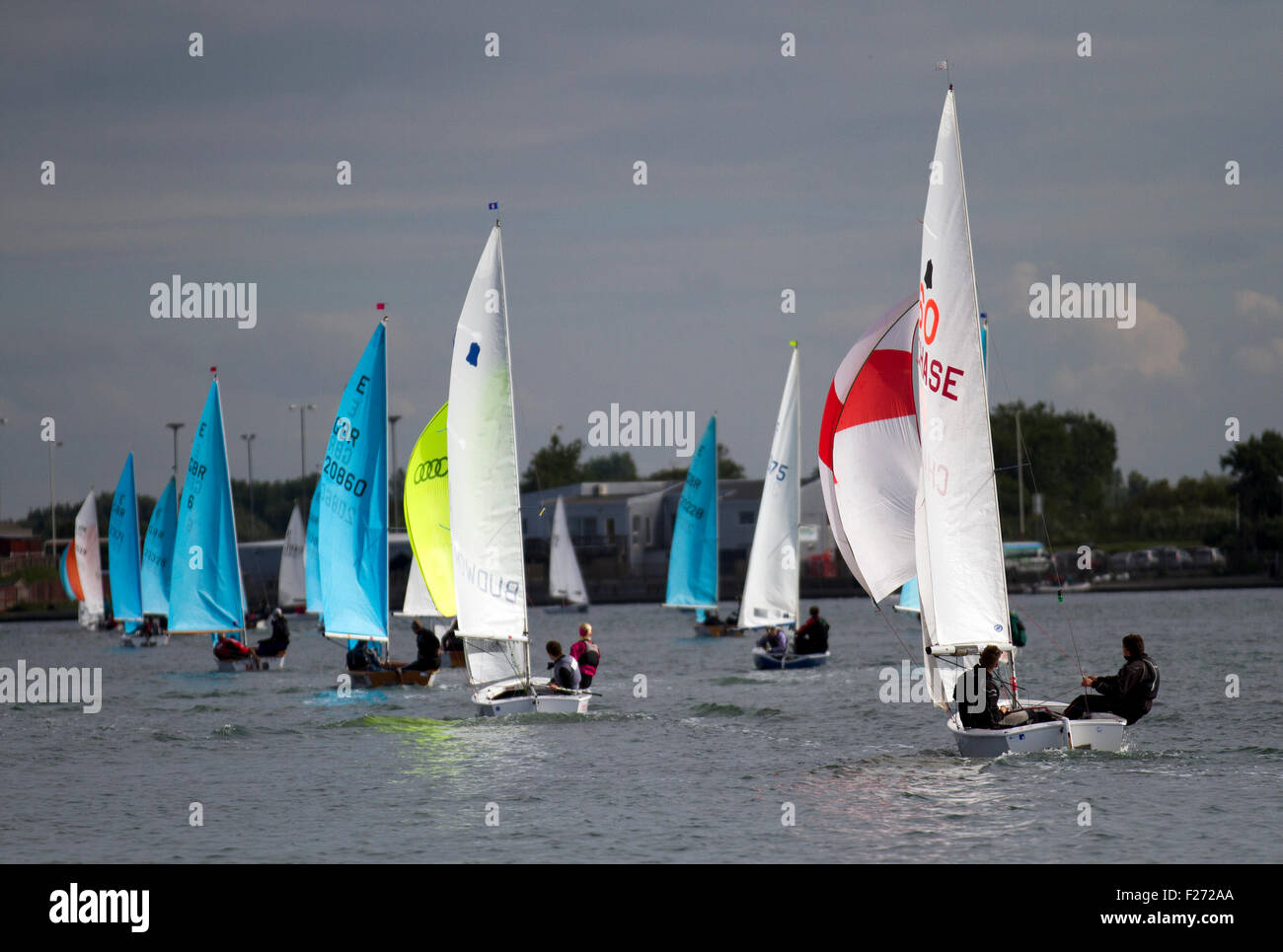 Southport, Merseyside, UK. 13th September, 2015. The Southport 24 Hour Race is a national sailing endurance race for two-handed sailing dinghies, with 63 Firefly, Lark, Enterprise and GP 14 boats competing. The race, hosted by the West Lancs Yacht Club, has a long history and is usually held in September. The race starts at 12 noon on the Saturday. The contestants then race their dinghies around the marine lake finishing at noon today.  During the hours of darkness, the helm and crew of each dinghy must keep a careful watch for other boats (often capsized).  Credit:  Mar Photographics/Alamy Li Stock Photo
