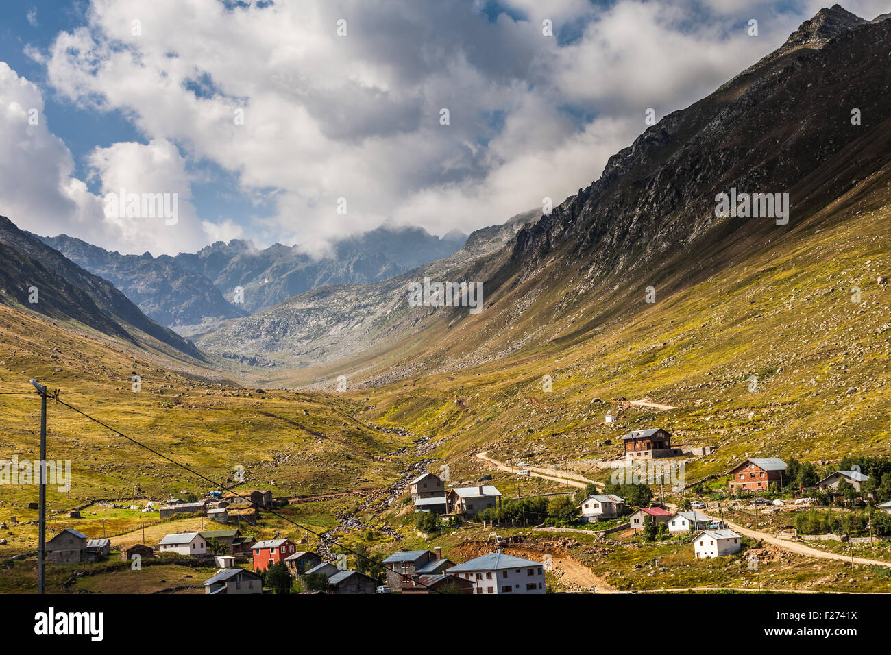 Mountain houses with clouds in Ayder Plateau, Rize, Turkey Stock Photo ...