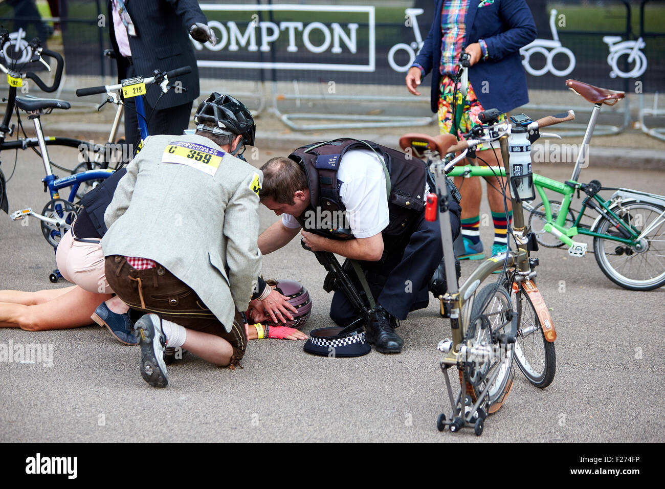 A woman is injured after crashing during the 10th Brompton World Championship bike race in St James Park Stock Photo Alamy