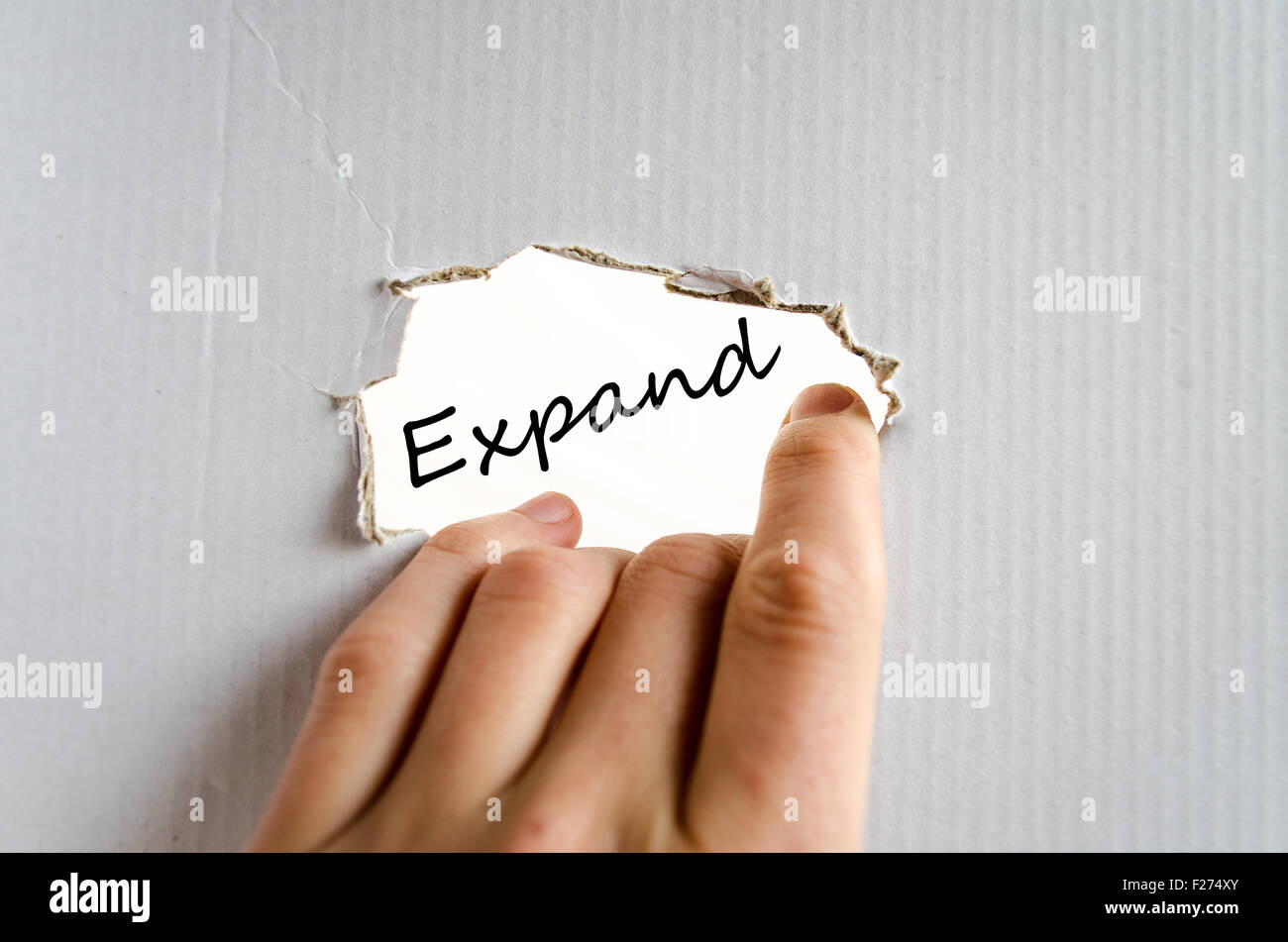 Expand text concept isolated over white background Stock Photo