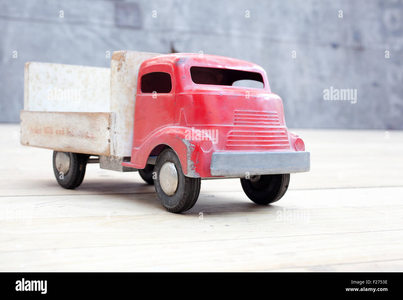 Vintage toy truck on the wooden floor Stock Photo Alamy