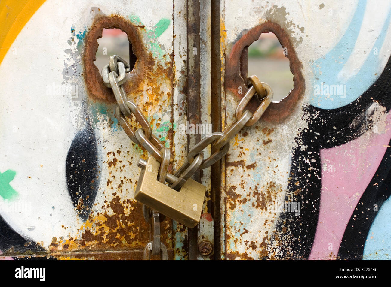 Bolt in a painted iron door Stock Photo Alamy
