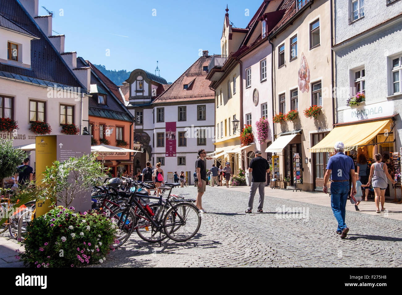 Füssen Town, cobbled street with typical Bavarian buildings and houses, Ostallgaü, Bavaria, Germany Stock Photo