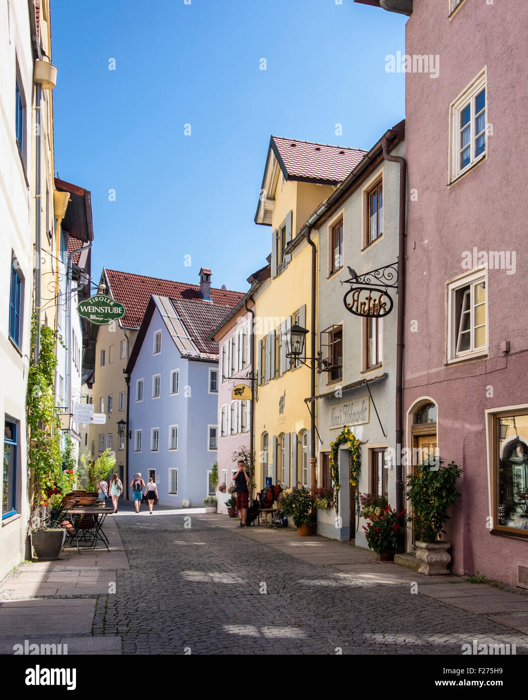 Füssen Town, cobbled street with typical Bavarian buildings and houses, Ostallgaü, Bavaria, Germany Stock Photo