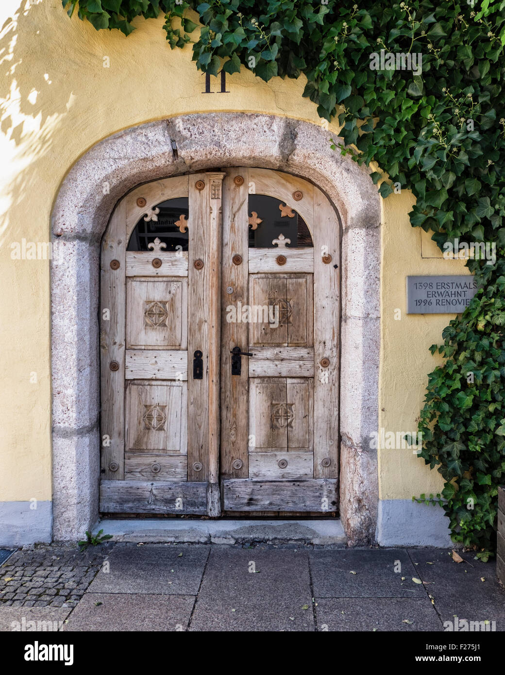 Historic building detail, old door wooden. Füssen Town, Ostallgaü, Bavaria, Germany Stock Photo