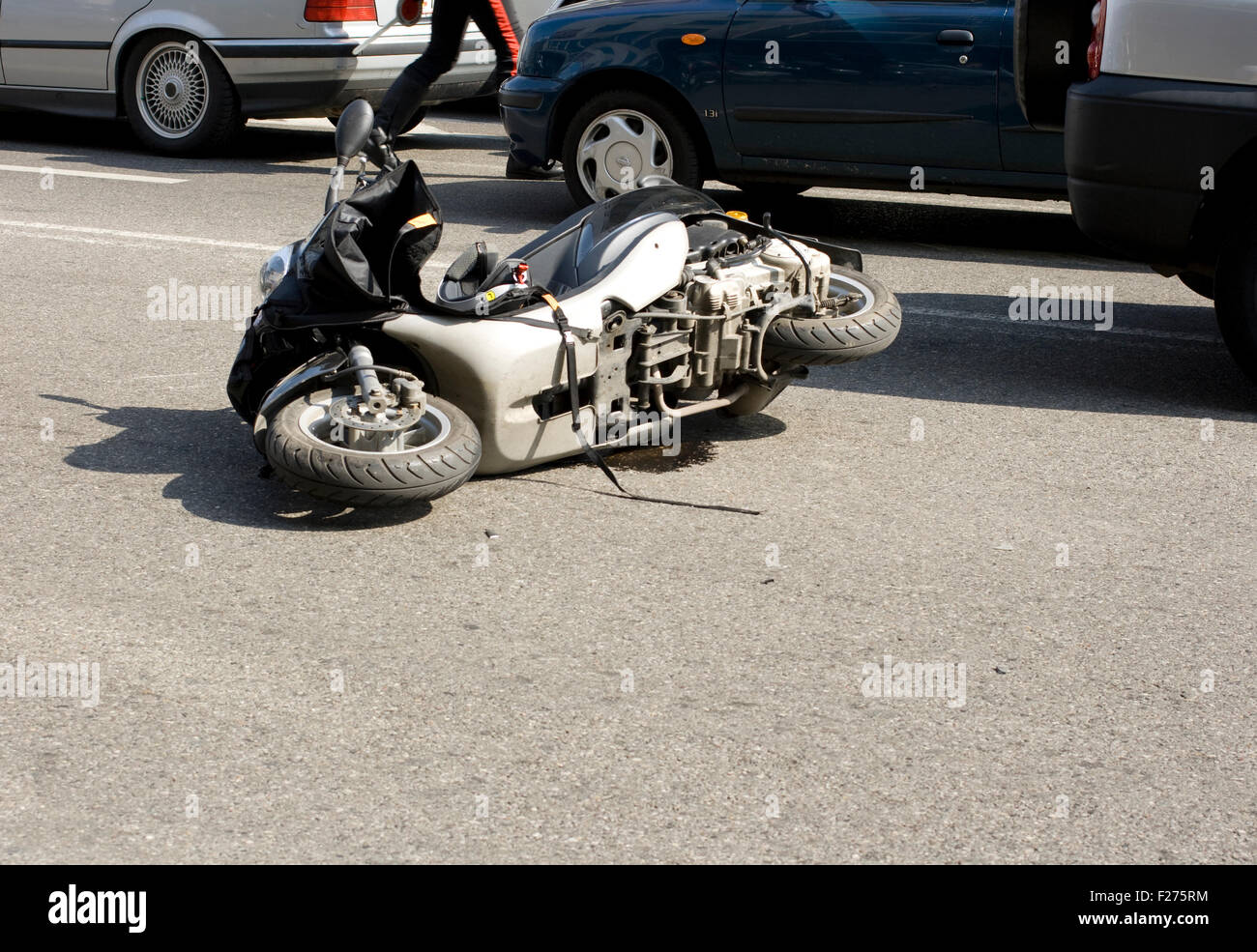 Scooter crash in the urban street Stock Photo - Alamy