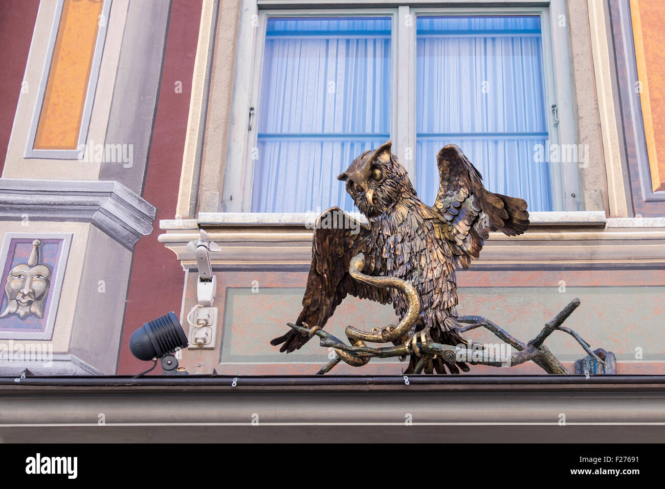 Stadt-Apotheke, Historic City Pharmacy building detail, owl with snake. Füssen Town, Ostallgaü, Bavaria, Germany Stock Photo