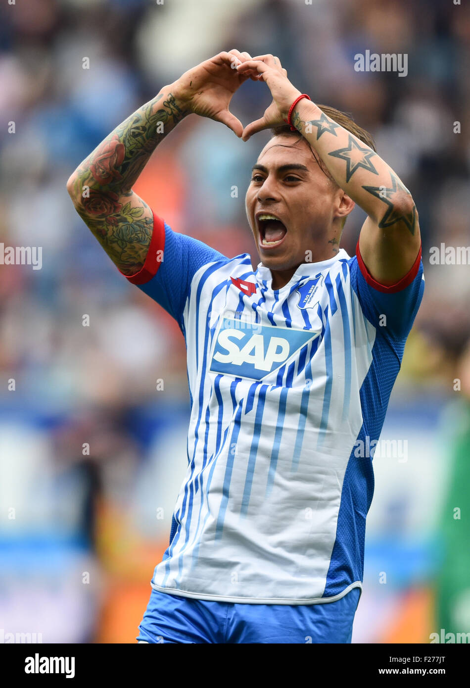 Hoffenheim's Eduardo Vargas celebrates his goal at 1:1 during the German Bundesliga soccer match between 1899 Hoffenheim and Werder Bremen at the 'Rhein-Neckar' arena, in Sinsheim, Germany, 13 September 2015. PHOTO: UWE ANSPACH/DPA    (EMBARGO CONDITIONS - ATTENTION: Due to the accreditation guidelines, the DFL only permits the publication and utilisation of up to 15 pictures per match on the internet and in online media during the match.) Stock Photo