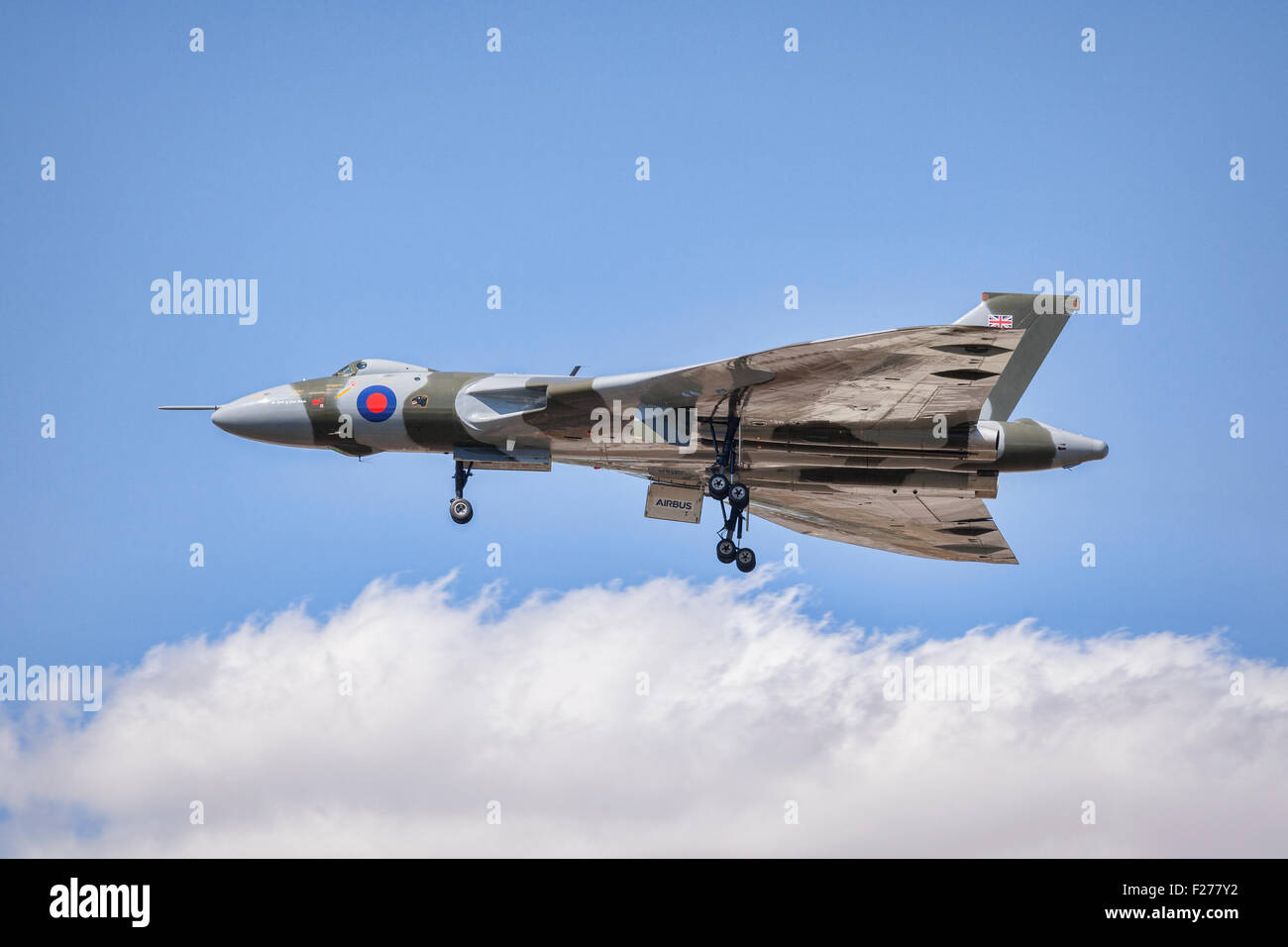 The last flying Avro Vulcan B2 bomber aircraft makes a low pass with landing gear down at RIAT 2015, at Fairford... Stock Photo