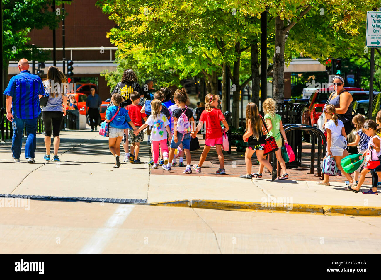 First Graders being taken on a picnic on the lawns outside the Wisconsin State Capitol Building in Madison Stock Photo