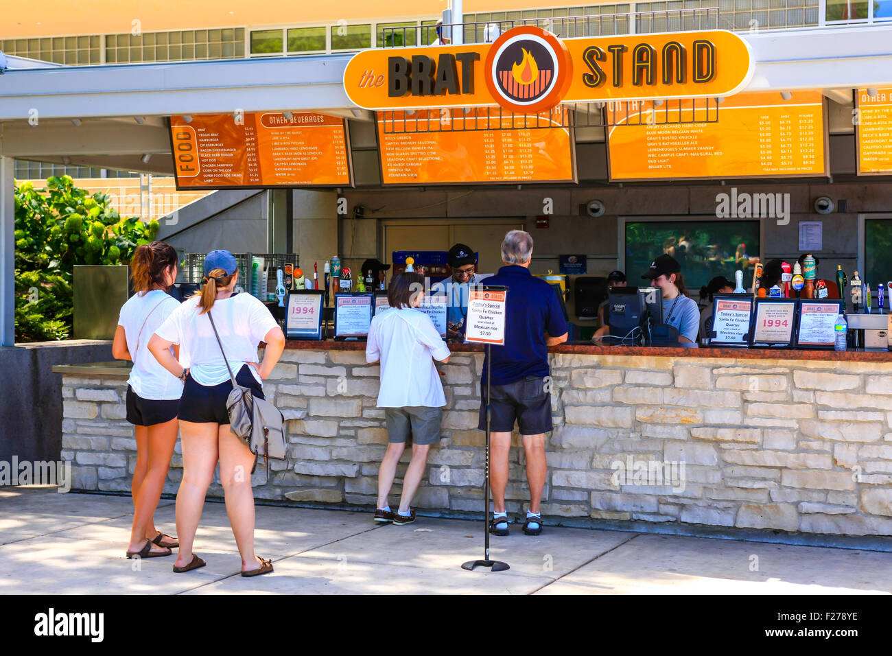 People lining up at the Brat Stand on the Memorial Union Terrace on the edge of Lake Mendota in Madison Wisconsin Stock Photo