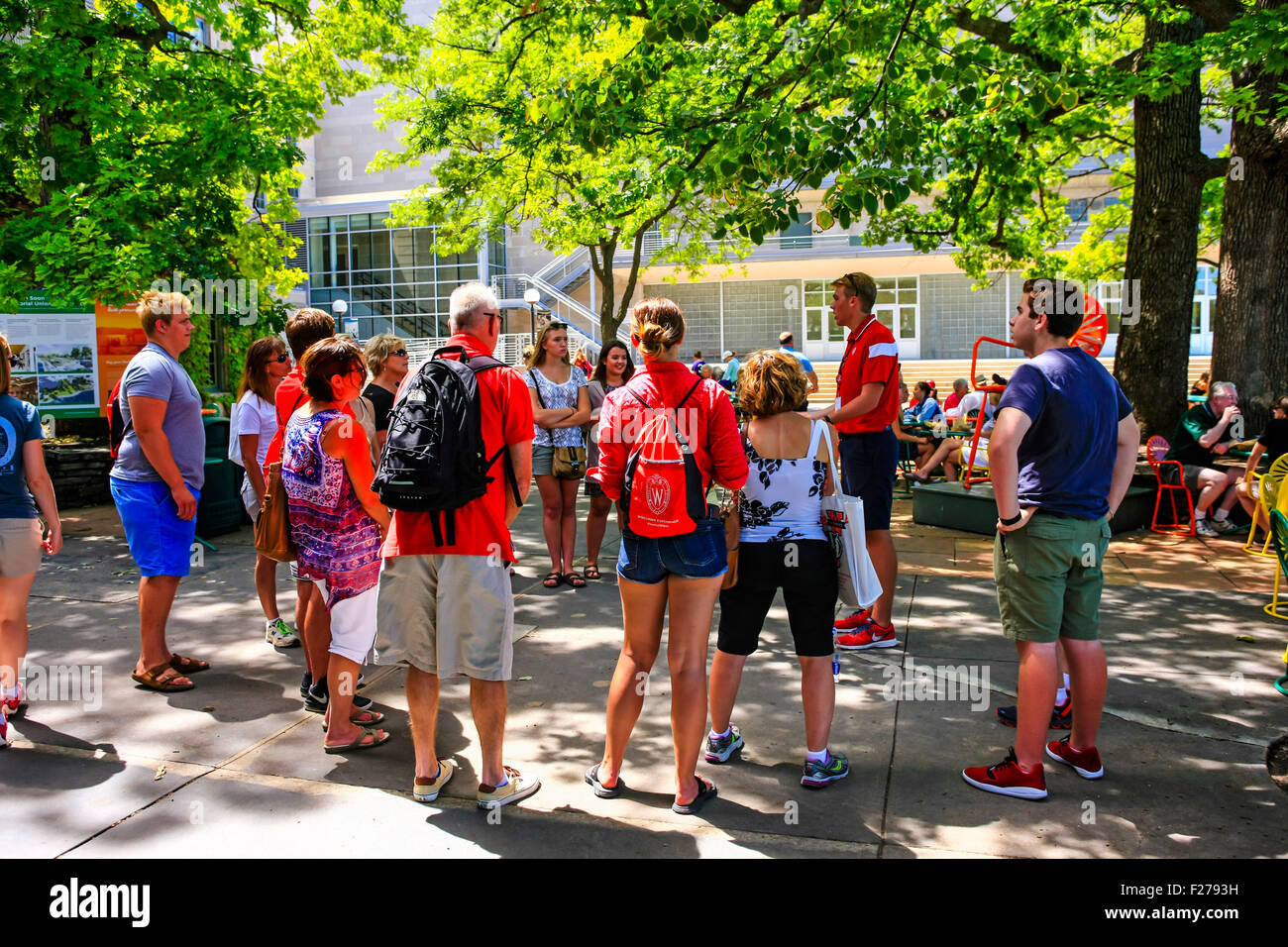 New students wearing backpacks at a familiarization class on the