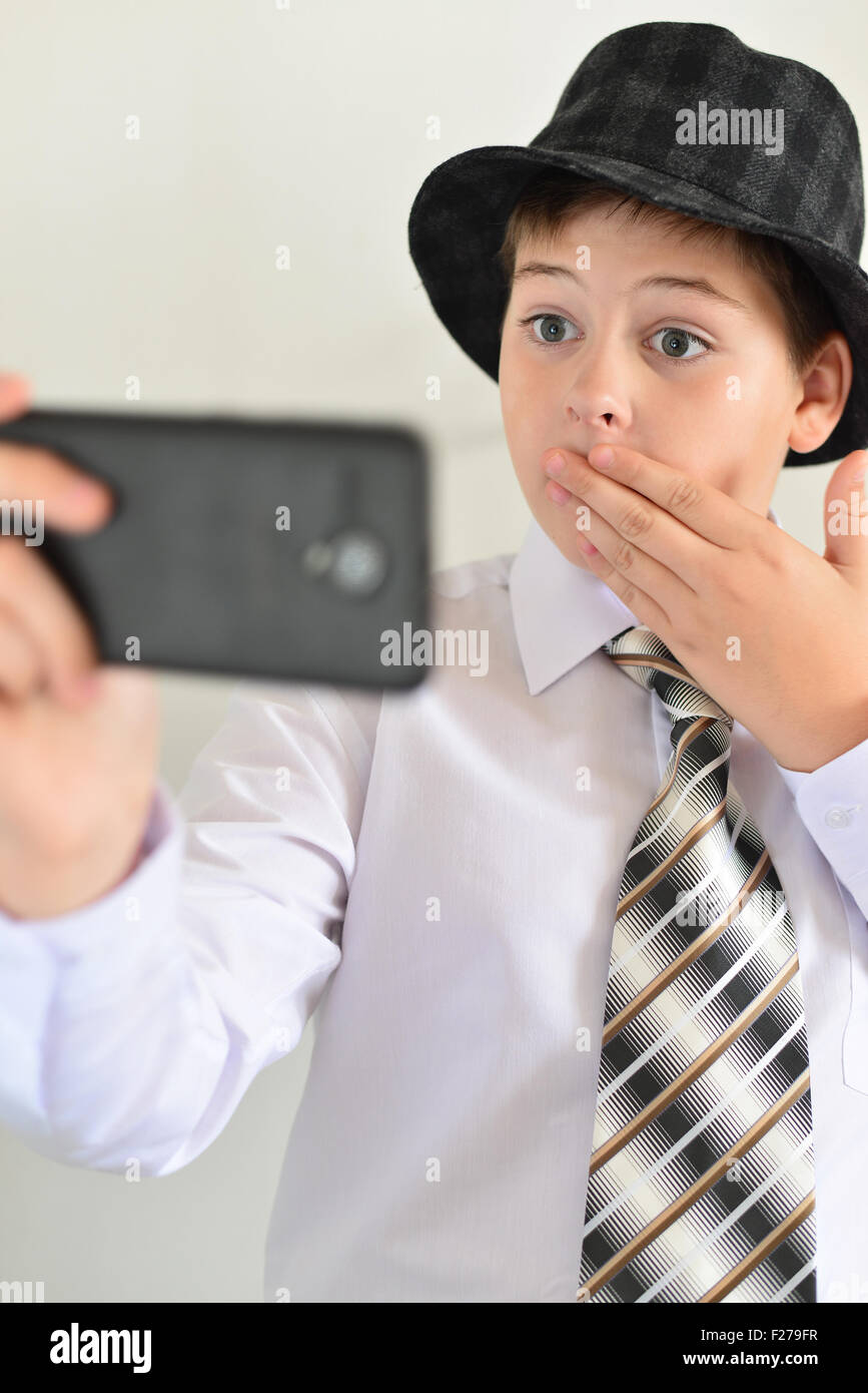 Kids Gadgets Happy Excited Little Boy Pointing Smartphone Blank White Stock  Photo by ©Milkos 615784680