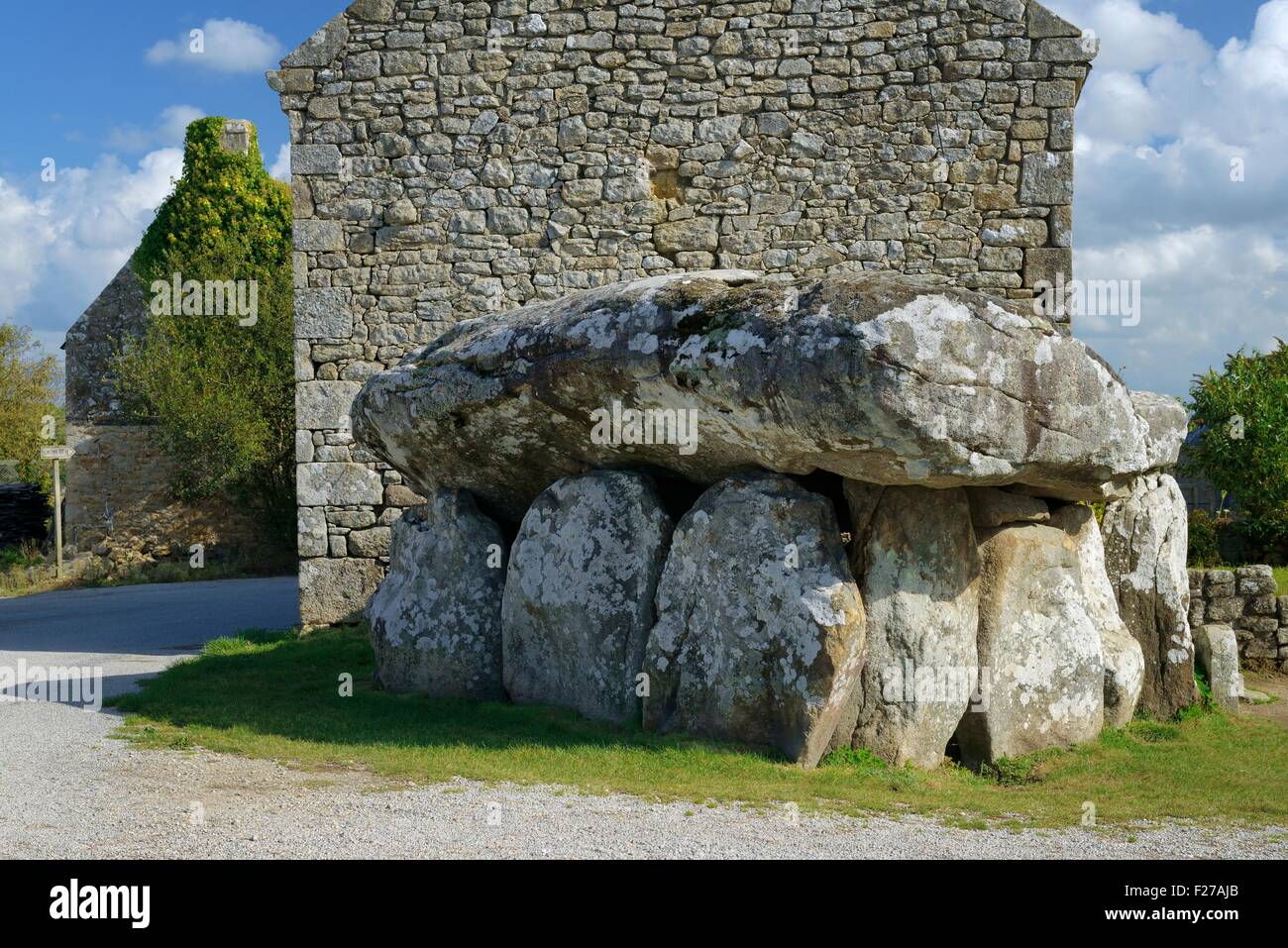 The massive Neolithic prehistoric Crucuno Dolmen in village of Crucuno, Brittany, France Stock Photo
