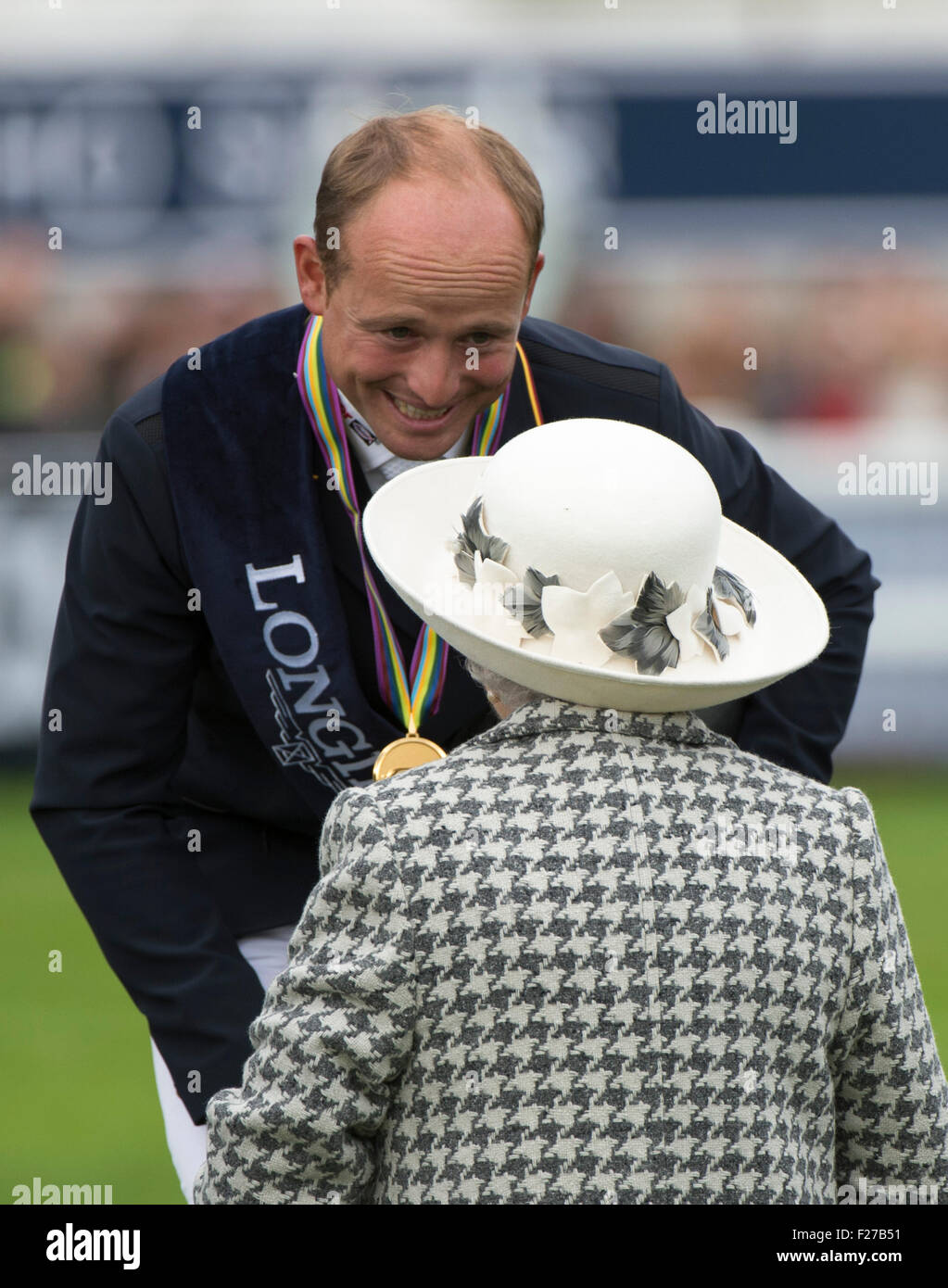 13th September 2015,  Blair Atholl,  Scotland.  HRH Queen Elizabeth II presents Michael Jung [GER] with the Individual Gold Medal. The Longines FEI European Eventing Championships 2015 Blair Castle. Stock Photo