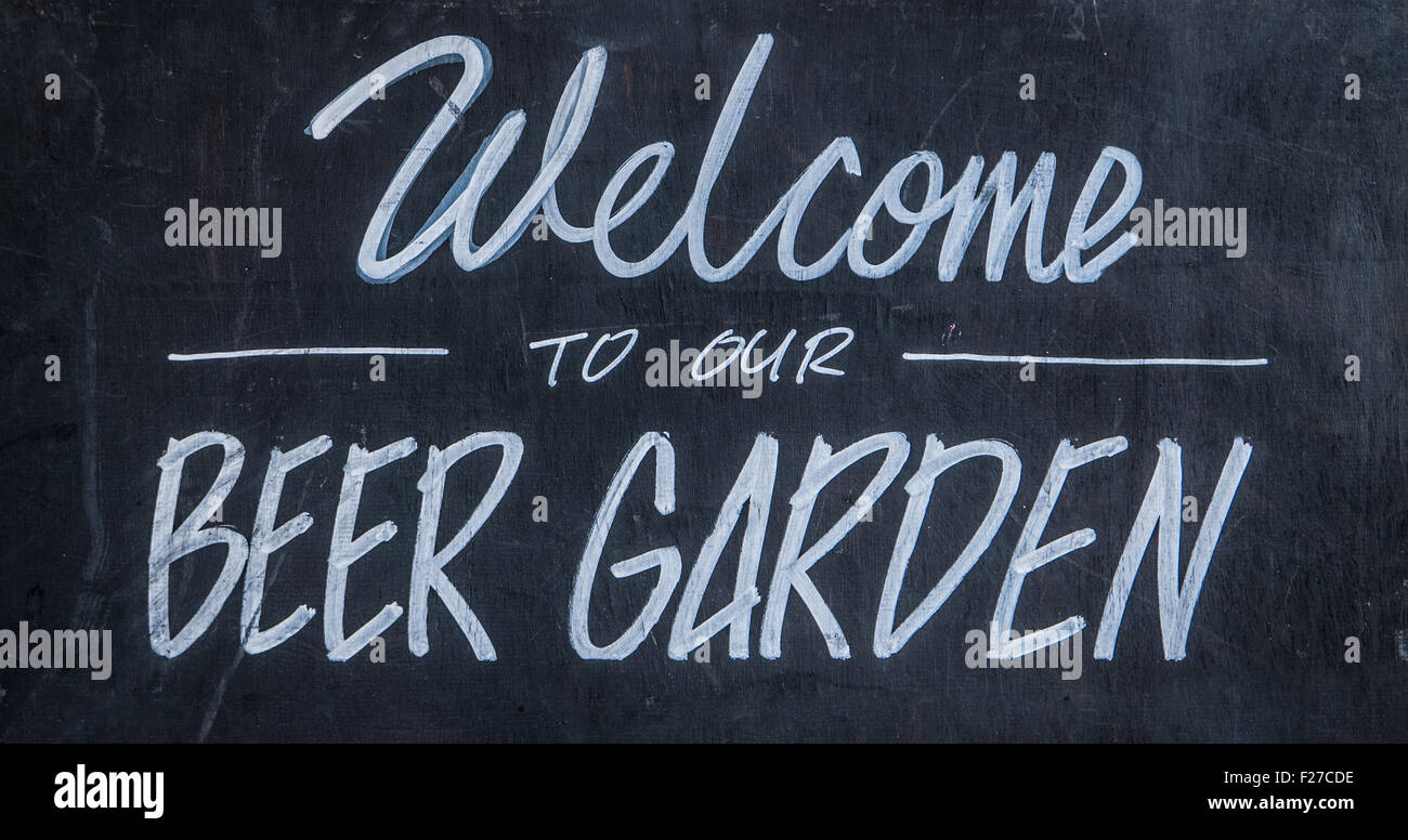 A Blackboard Sign Outside A Bar Or Pub Saying Welcome To Our Beer Garden Stock Photo