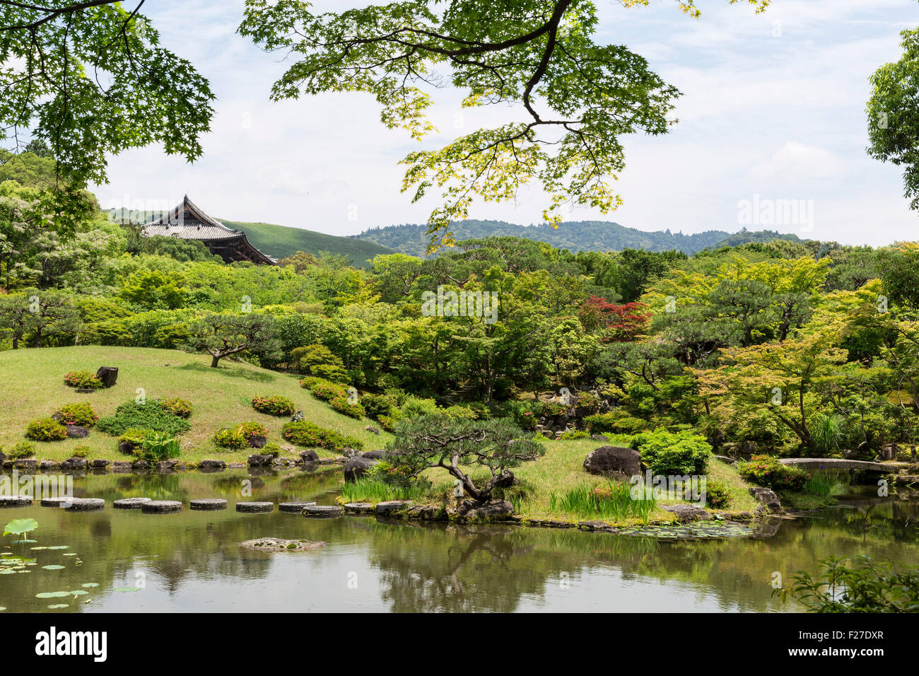 Isuien Garden in summer, with the borrowed scenery of the Nandaimon Gate and Mount Wakakusayama. Nara, Nara Prefecture, Kansai r Stock Photo
