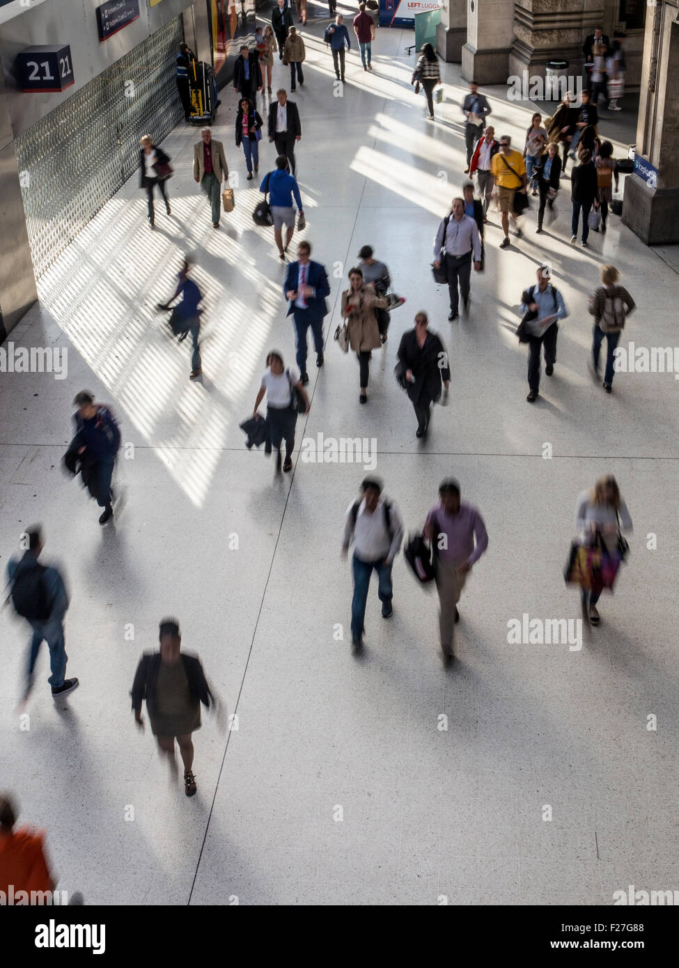Crowds of people rushing to get home from work after a long day at work Stock Photo