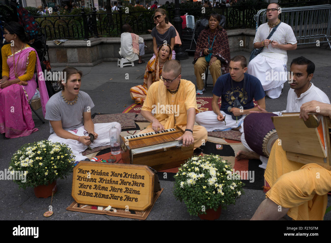 Members of the Hare Krishna movement chanting in Manhattan's Union Square Park. Stock Photo