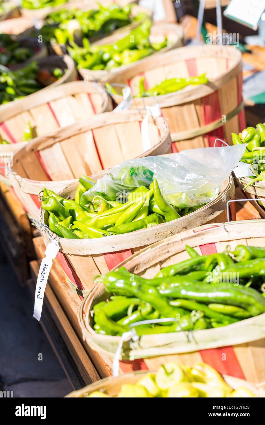 Green chili peppers in baskets at the local Farmers Market Stock Photo ...