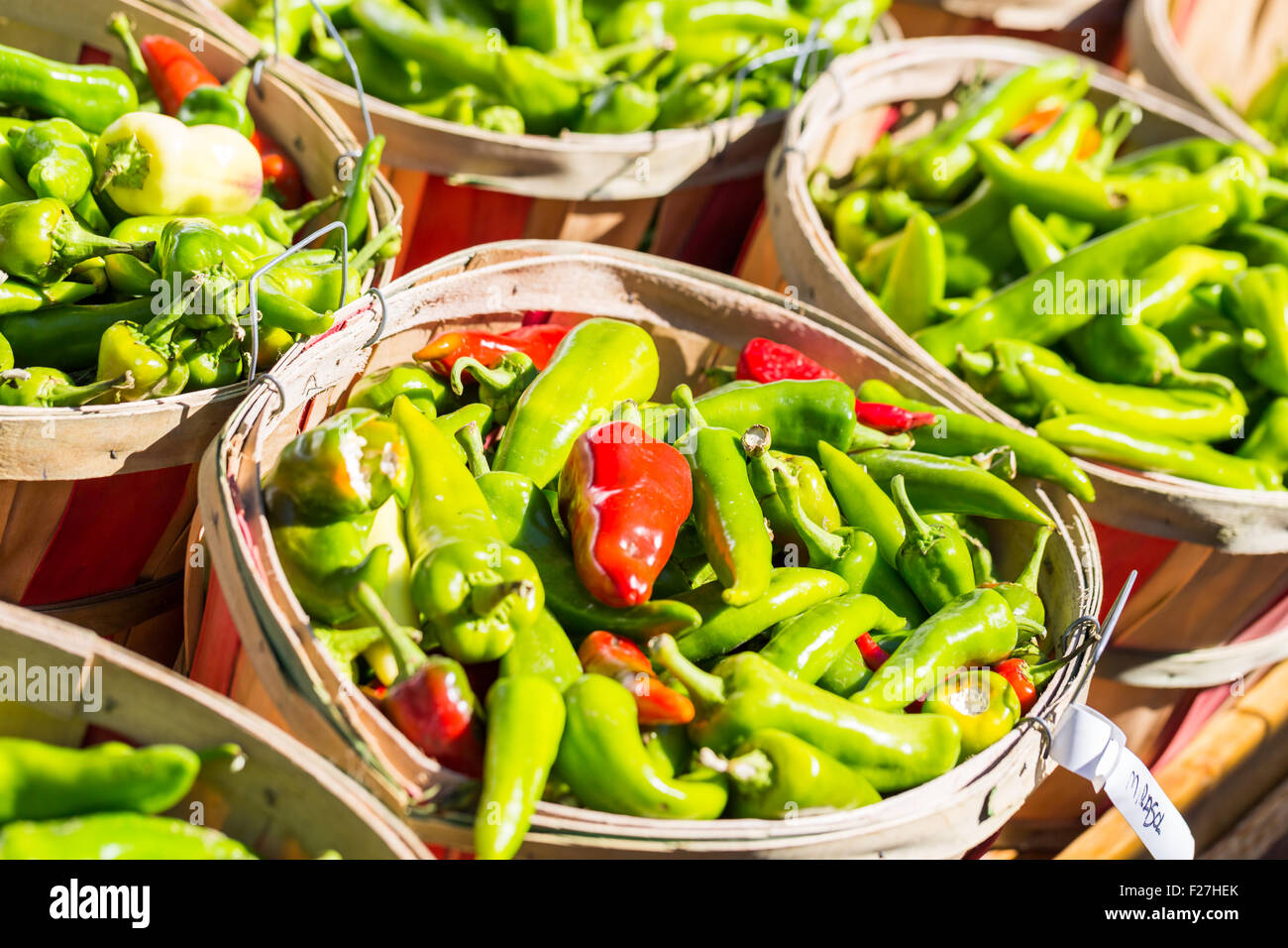 Green chili peppers in baskets at the local Farmers Market Stock Photo ...