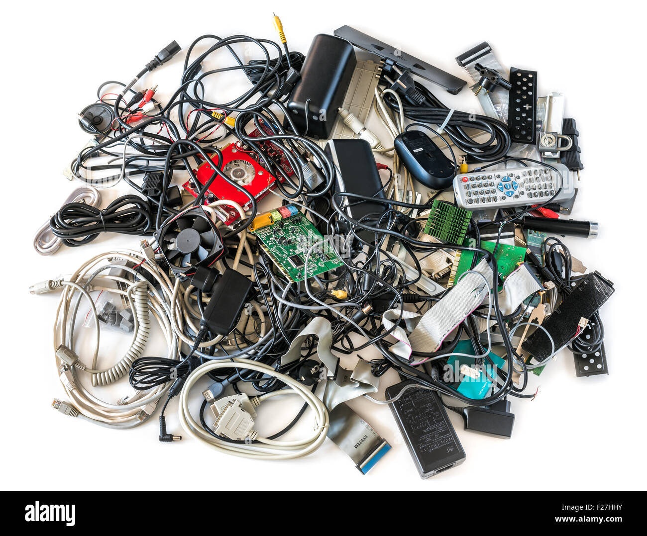 Pile of Old Computer Cables and Devices Isolated on White Background Stock Photo