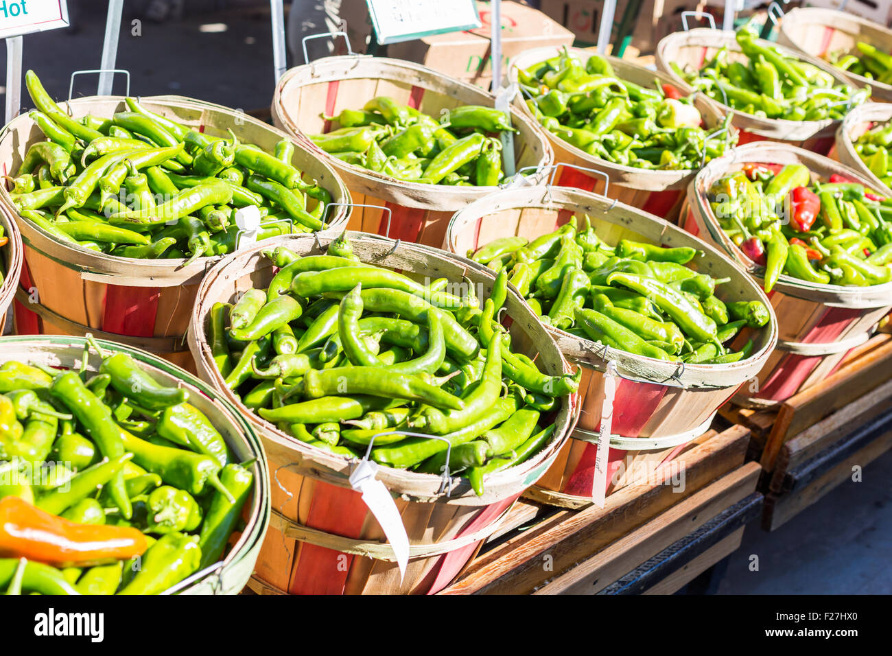 Green chili peppers in baskets at the local Farmers Market Stock Photo ...