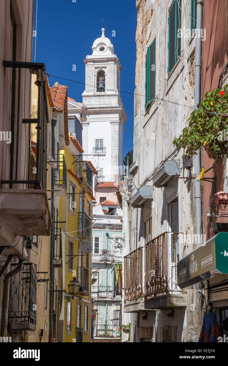 Narrow streets and churches of the Alfama district of Lisbon, Portugal Stock Photo