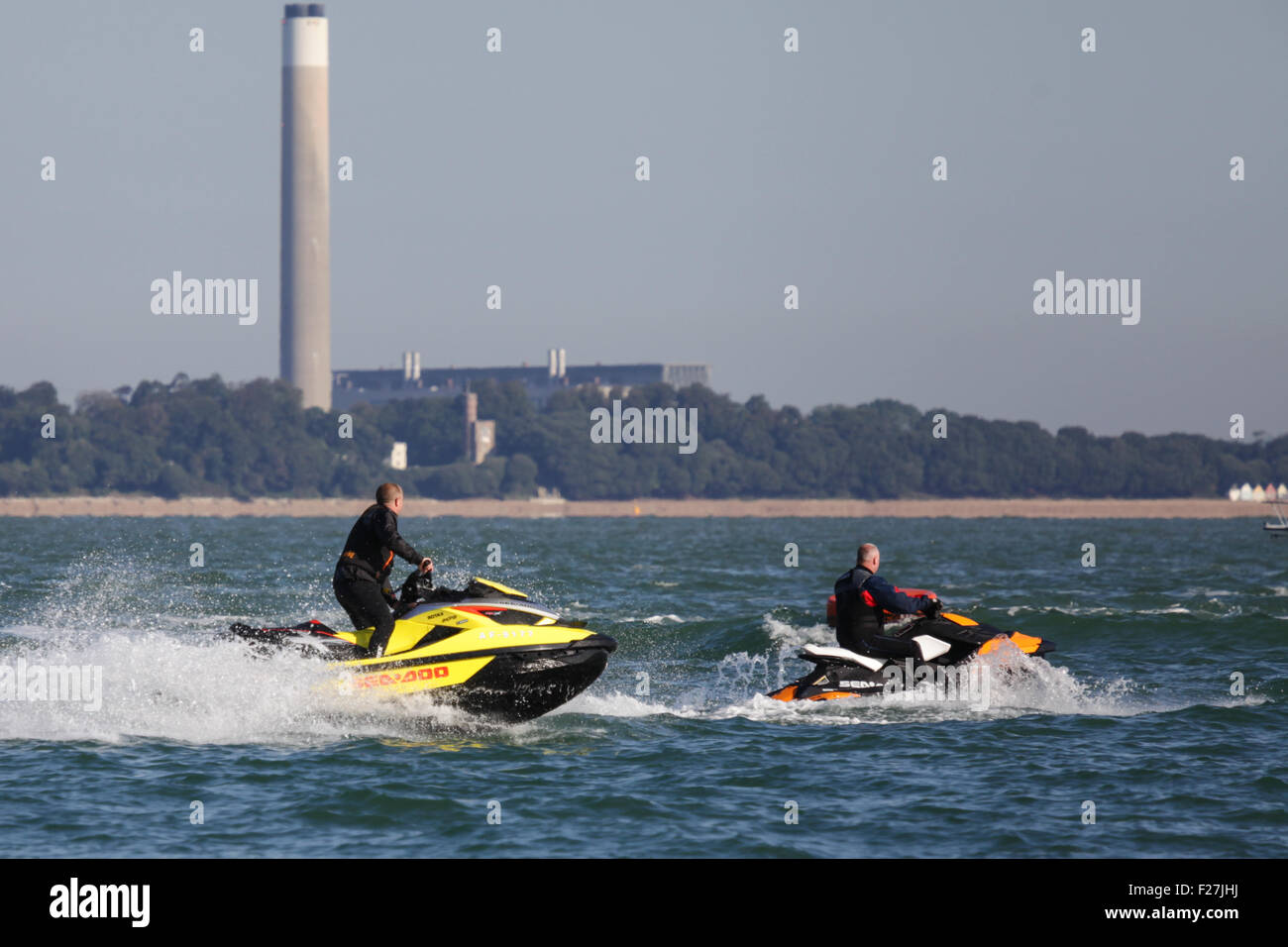 Men on Jet skis in Cowes on the Isle of Wight, UK Stock Photo