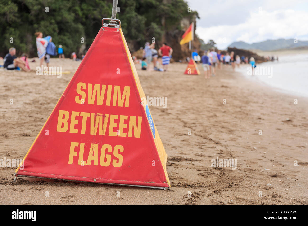 A cone with a safety swim between flags at Hotwater