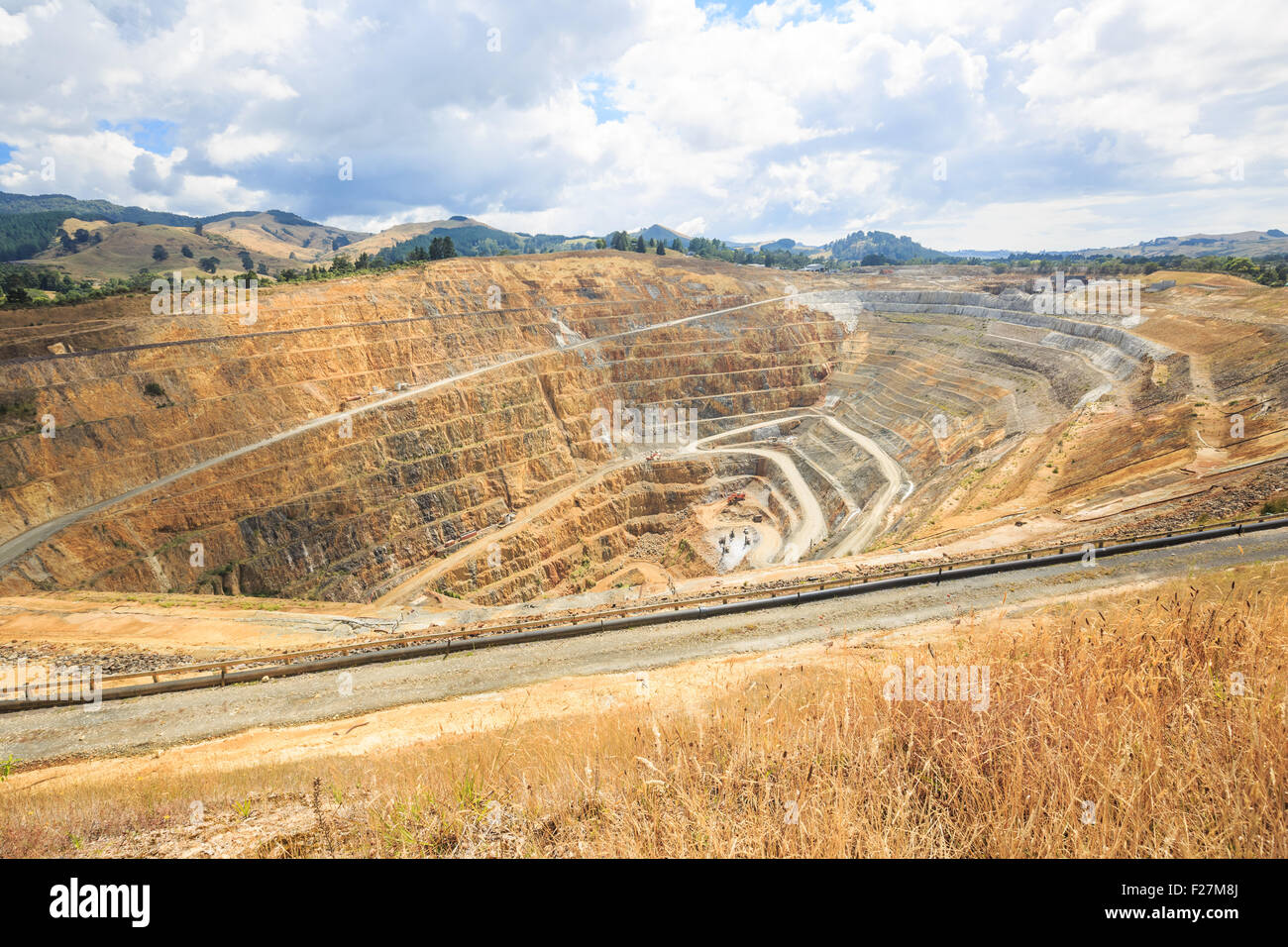 Surface mining of gold in an open pit mine in Waihi, New Zealand Stock Photo