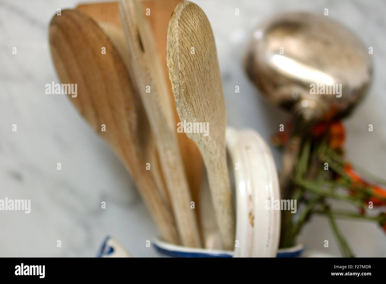 Wooden ladles insider a ceramic anphora Stock Photo