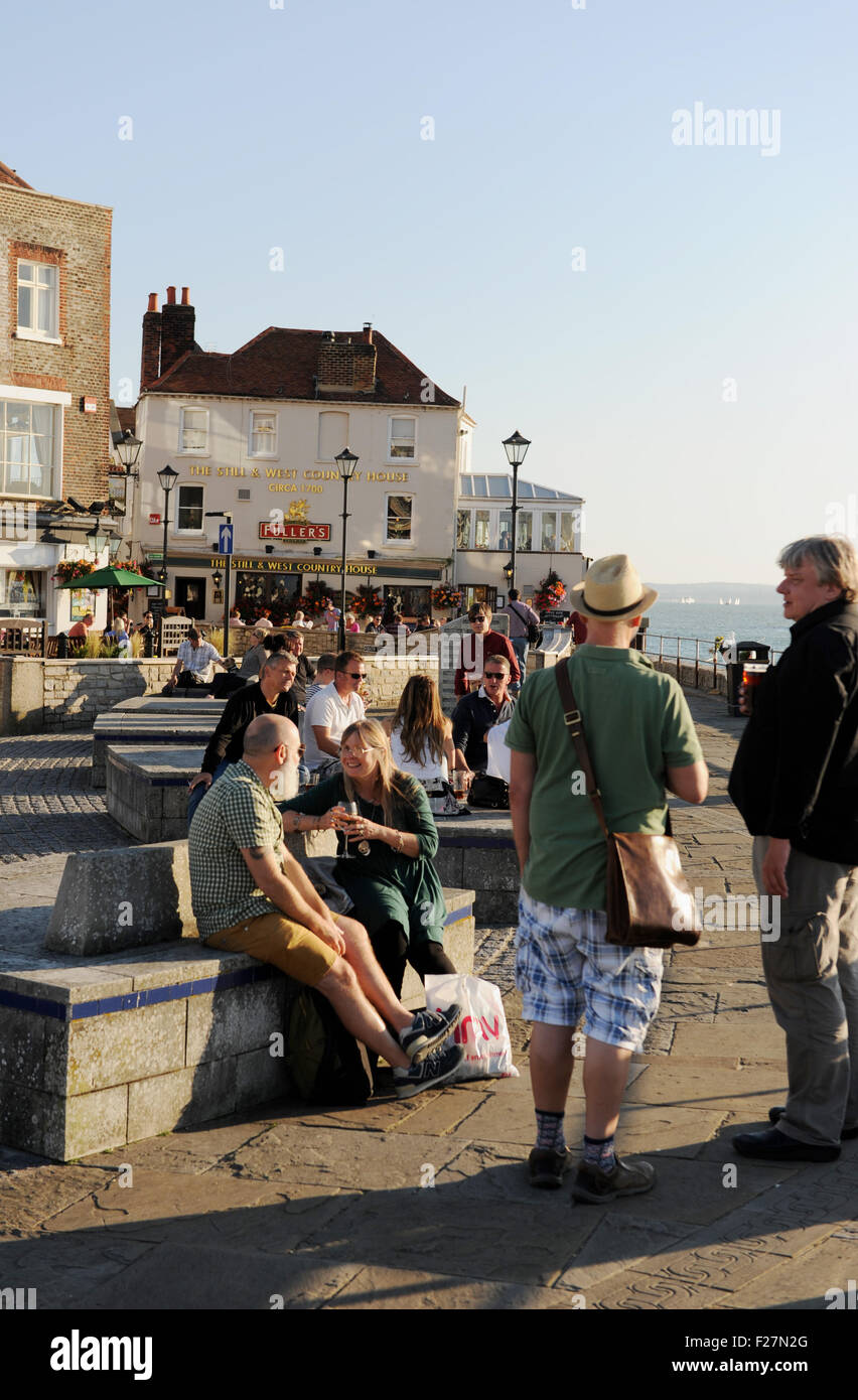 Portsmouth Hampshire UK - People drinking and enjoying warm evening on old town quay Stock Photo