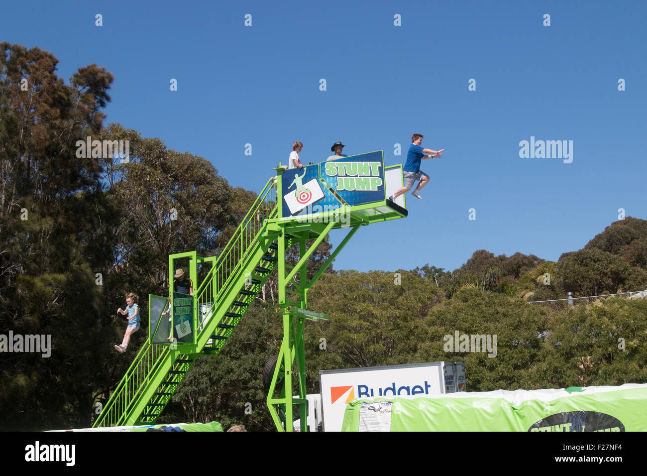 Stunt jump at Sydney primary school hosts the local community fete fair to raise funds for the school,Avalon,Sydney,Australia Stock Photo