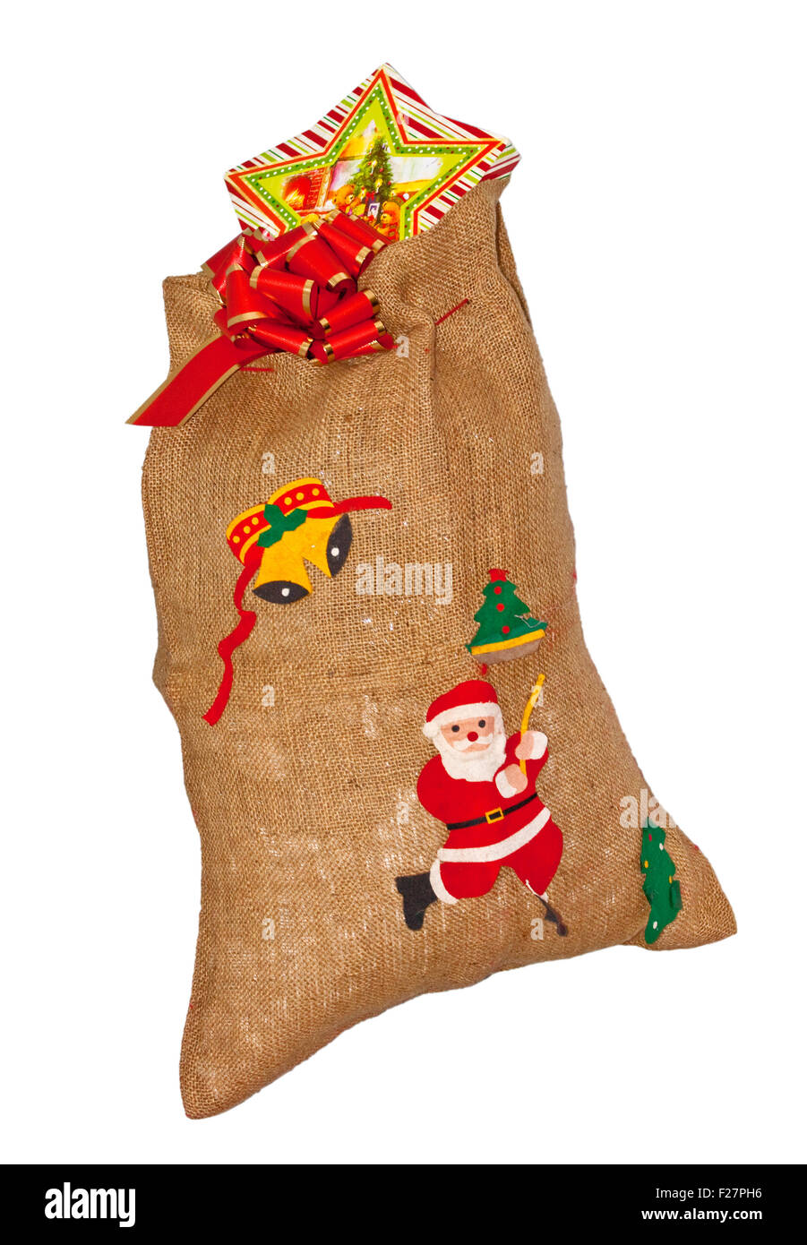 Santa claus jute bag with present isolated on white Stock Photo - Alamy