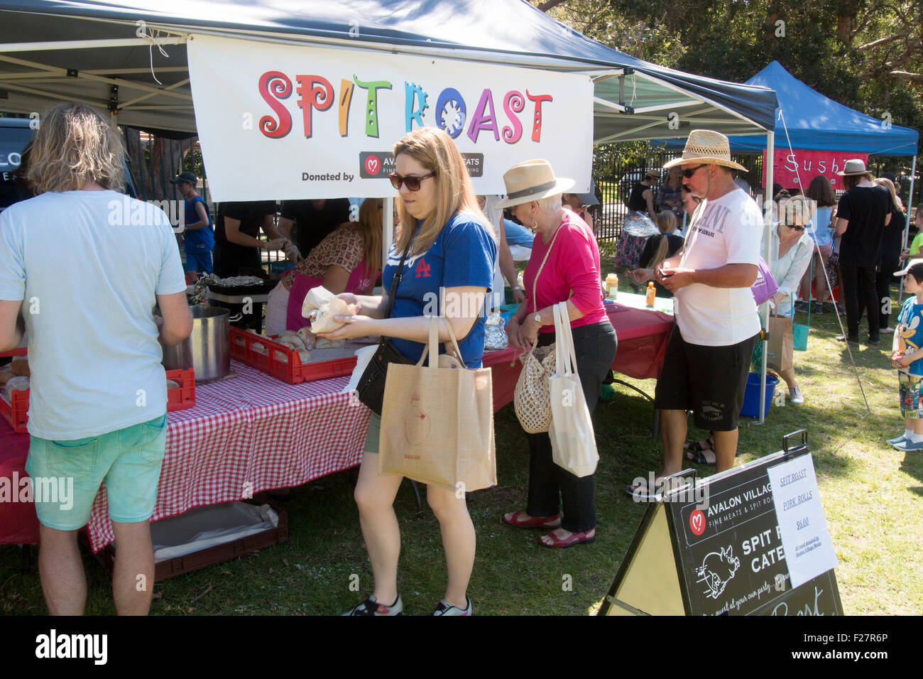 Spit Roast at Sydney primary school hosts the local community fete fair to raise funds for the school,Avalon,Sydney,Australia Stock Photo