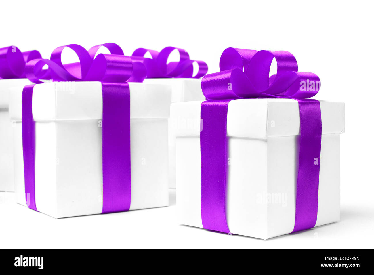 White gift box with purple ribbon bow Stock Photo Alamy