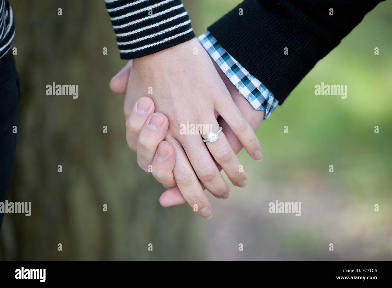 Holding Hands Stock Photo