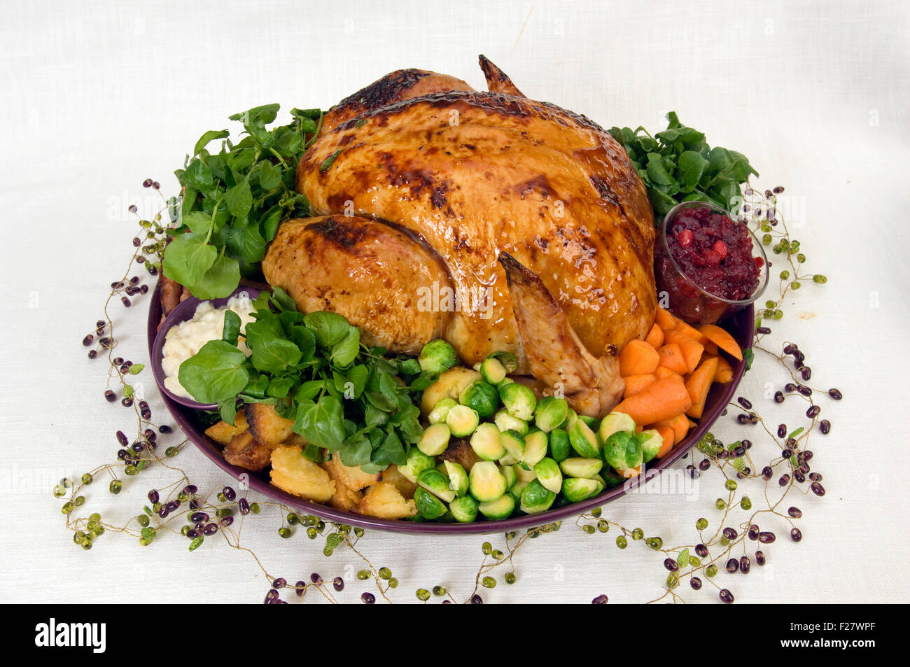 A Christmas roast turkey dinner with roast potatoes, chestnut stuffing