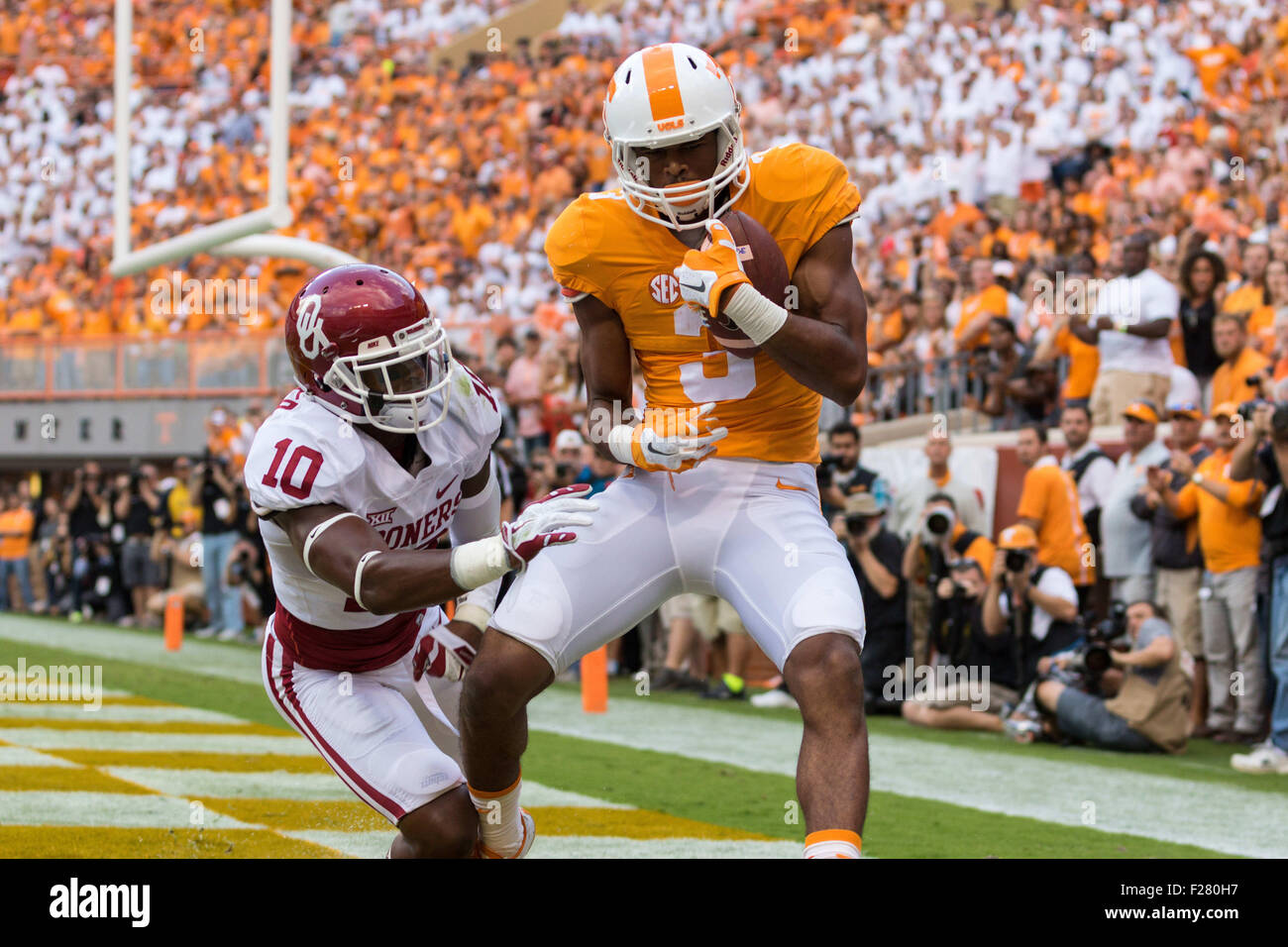 September 12, 2015: Josh Malone #3 of the Tennessee Volunteers catches the ball for a touchdown while beign defended by Steven Parker #10 of the Oklahoma Sooners during the NCAA Football game between the University of Tennessee Volunteers and the Oklahoma Sooners at Neyland Stadium in Knoxville, TN Tim Gangloff/CSM Stock Photo