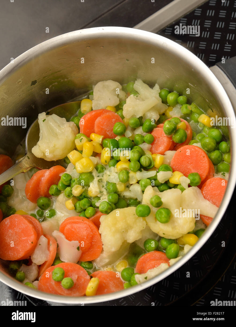 Boiled colorful vegetables with butter and herbs Stock Photo Alamy