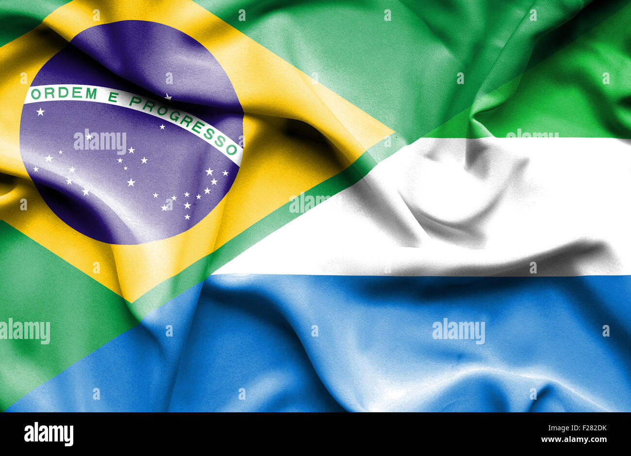 Waving flag of Sierra Leone and Stock Photo - Alamy