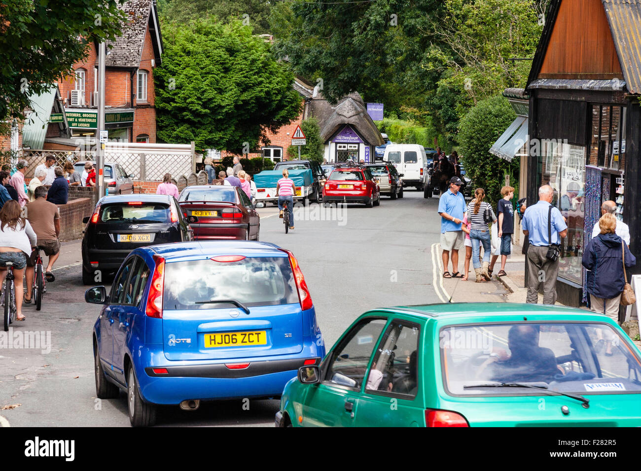 England, New Forest, Town of Burley. View along busy street with